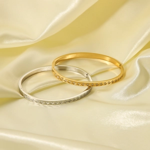 18k gold and silver plated stainless steel bangles with rhombic engraving and zircon stones