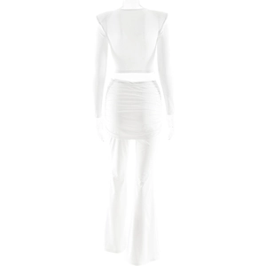 Detail view of white two-piece set featuring a cropped top and ruched flared trousers