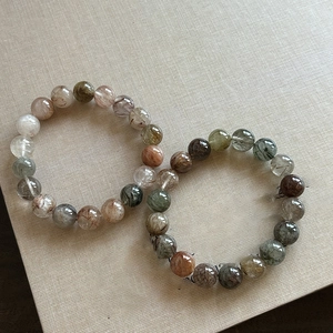 Natural multi-color rutilated quartz beaded bracelet with polished gemstone crystals
