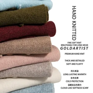 Chunky knit scarf stack in multiple colors like pink and blue for winter warmth