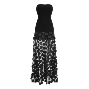 Detail of black strapless evening dress with 3D polka dots on translucent tulle fabric