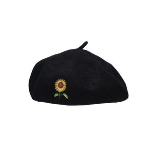 Vintage wool beret in black with high-quality yellow sunflower embroidery detail