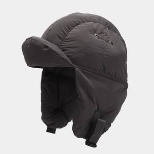 Detail of dark grey aviator hat featuring windproof fabric and metal ventilation eyelets