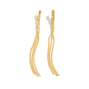 Detailed macro view of golden tassel earrings featuring flat snake chains and woven metal