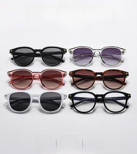 Detail view of square sunglasses frames with metallic T-shaped hinge accents in six colors