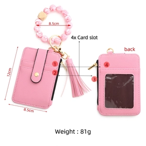 Pink lychee texture leather card holder with beaded silicone wristlet and tassel keychain