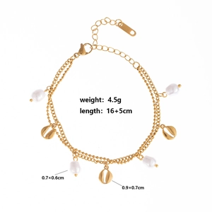 Detail of gold double-layer bracelet with seashell charm and pearl showing 16+5cm length