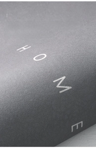 Detailed texture of Nappa leather bath mat with minimalist HOME printed lettering