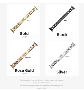 Detail view of four metal link watch bands in gold, black, rose gold, and silver finishes