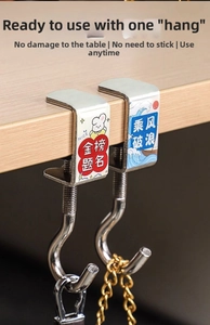 Detail view of adjustable metal desk hook with C-clamp for student schoolbags and accessories