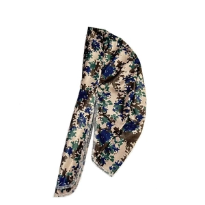 Detailed view of digital camouflage durag with silky satin fabric and precise white stitching