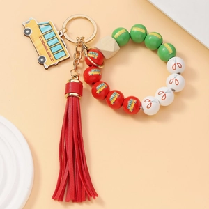 Colorful acrylic beaded school bus keychain with red tassel and wooden beads