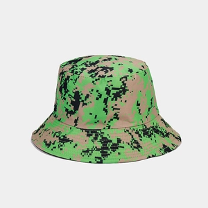 Detail shot of a camo bucket hat featuring neon green and black digital pixelated patterns