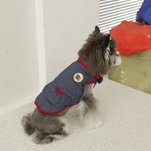 Deep blue heart-quilted pet denim vest with red trim and cartoon patch for small dogs