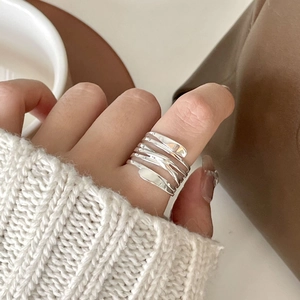 925 sterling silver multi-layer woven ring worn on hand with elegant spiral design
