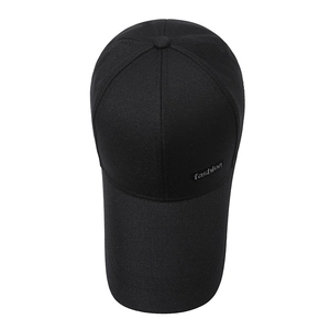 Classic black cotton baseball cap with long brim and fashion tag for outdoor sun protection