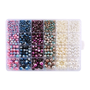 Close-up of 24-compartment storage box filled with colorful clay beads for DIY jewelry