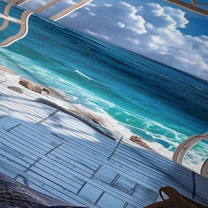 Close-up of bohemian tapestry showing high-definition tropical beach print texture