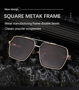 Detail of square metal frame sunglasses with double bridge on dark stone texture