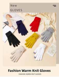 Close-up of knit winter gloves in various colors showing touch screen tips and cozy texture