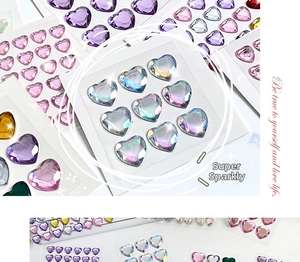 Macro shot of 3D colorful heart-shaped diamond gem stickers for DIY crafts and rewards