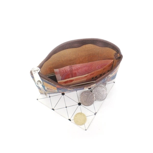 Top view of patchwork cork coin purse interior showing silver zipper and coin storage
