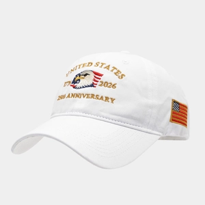 Detail of white 250th anniversary baseball cap with eagle embroidery and USA flag label