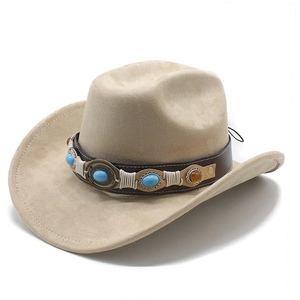 Detail of western felt cowboy hat with leather band, turquoise stone, and metal disk