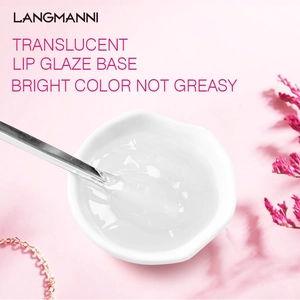 DIY translucent lip glaze base gel in a white bowl with metal spatula for lip gloss making