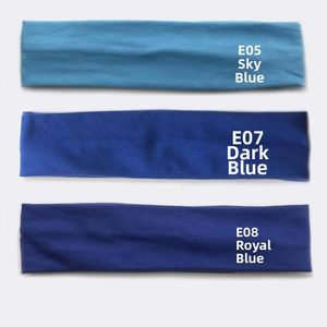 Detail view of cotton sports headbands in sky blue, deep blue and royal blue knit texture