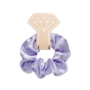 Glossy purple satin scrunchie wrap on a diamond shaped display card for hair accessory