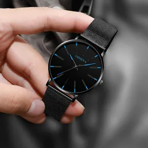 Minimalist ultra-thin mesh band watch with black dial and blue hour markers