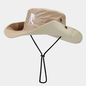 Detail of outdoor sun hat with Bigfoot embroidery, adjustable chin strap, and side vents