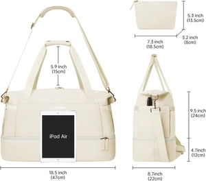 Detail view of large cream travel duffel bag with USB port and matching accessory pouch