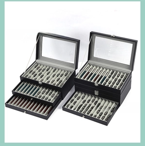Detail of multi-tier pen display box with leather texture and clear viewing window