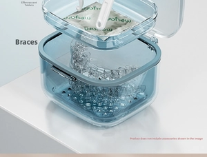 Three-layer blue clear dental retainer case with drainage holes and cleaning tablet