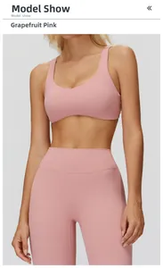 Close-up of Grapefruit Pink yoga bra and leggings set with high-stretch fabric and U-neck