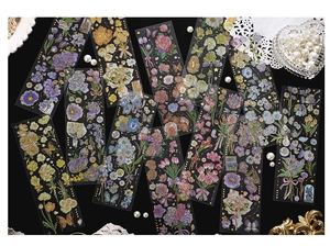 Detailed view of vintage PET stickers featuring gold-foiled flowers and butterflies