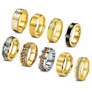 9-piece set of stainless steel spinner rings in gold, silver, and black finishes
