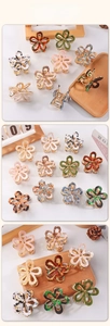 Detailed close-up showing multi-color flower hair claws in various elegant patterns