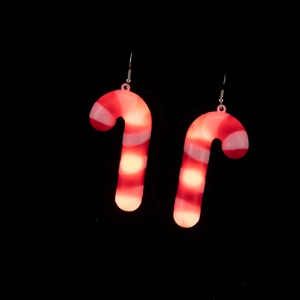 Glow-in-the-dark candy cane earrings with red and white LED light stripes for Christmas