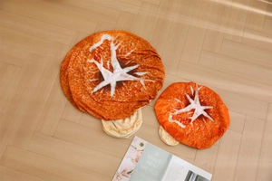 Macro detail of cartoon mushroom plush cover with realistic red orange texture print