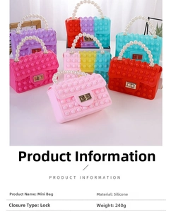 Macro detail of silicone mini bag showing pop bubble texture and pearl bead handle