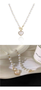 Detailed view of pearl necklace with rhinestone heart pendant and golden OT clasp design