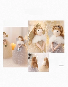 Detail of Christmas angel figurines with knit hair, mesh dresses and glitter star accents