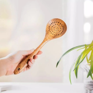 Teak wood slotted spoon with long handle for kitchen cooking and food serving