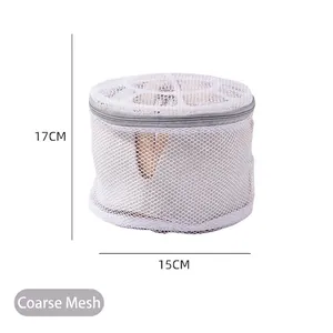 Cylindrical coarse mesh laundry bag for washing machines with gray zipper 15x17cm