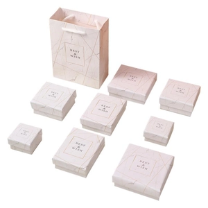 Pink marble jewelry packaging set with gift bag and boxes for rings and necklaces
