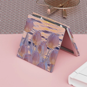 Portable folding makeup mirror featuring romantic tulip floral pattern and sunset water design