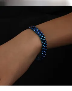 Close-up of a blue presidential link bracelet made of titanium steel on a wrist